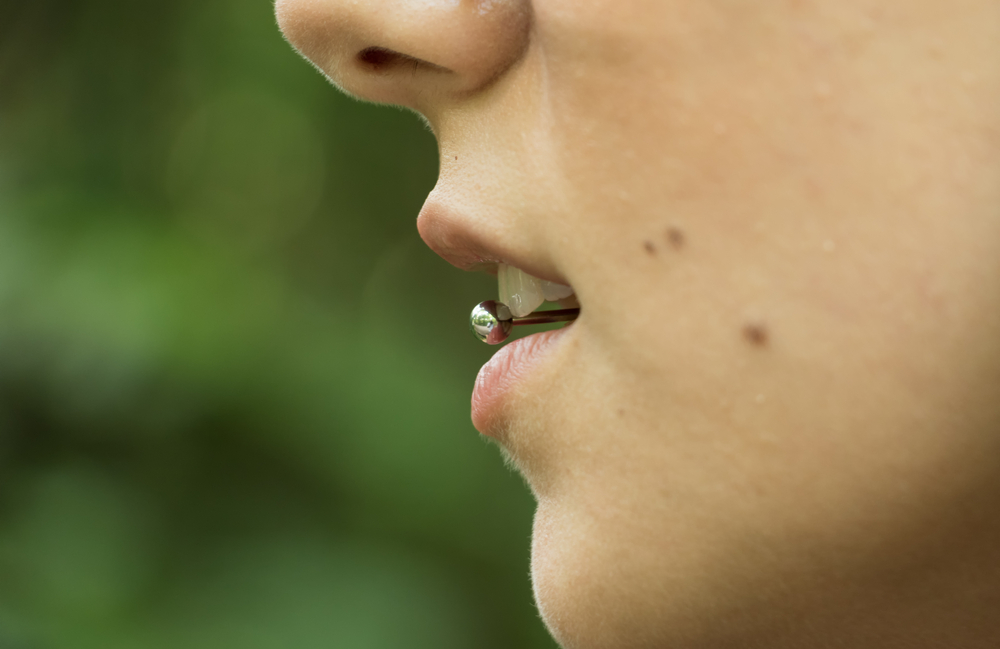 The Effects of Oral Piercings on Dental Health Image